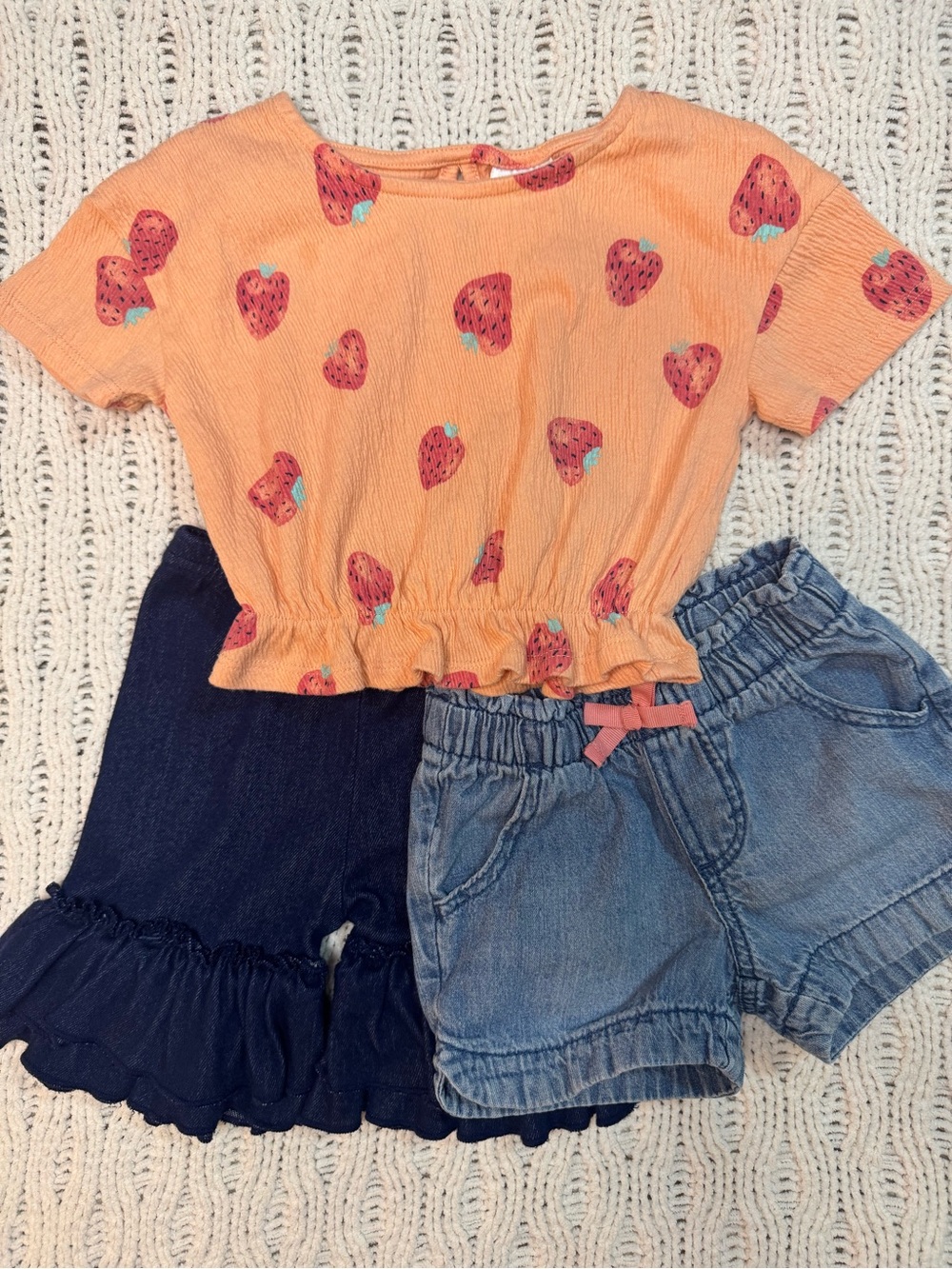2T Bundle: Girls Printed Peplum Top, ruffle bottoms, and Cherokee Jean shorts.